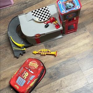 Disney red Lightning McQueen playset with yellow trumpet